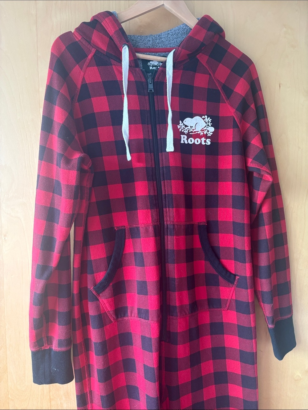 Roots Red and Black Buffalo Plaid Hooded pyjama onesie.